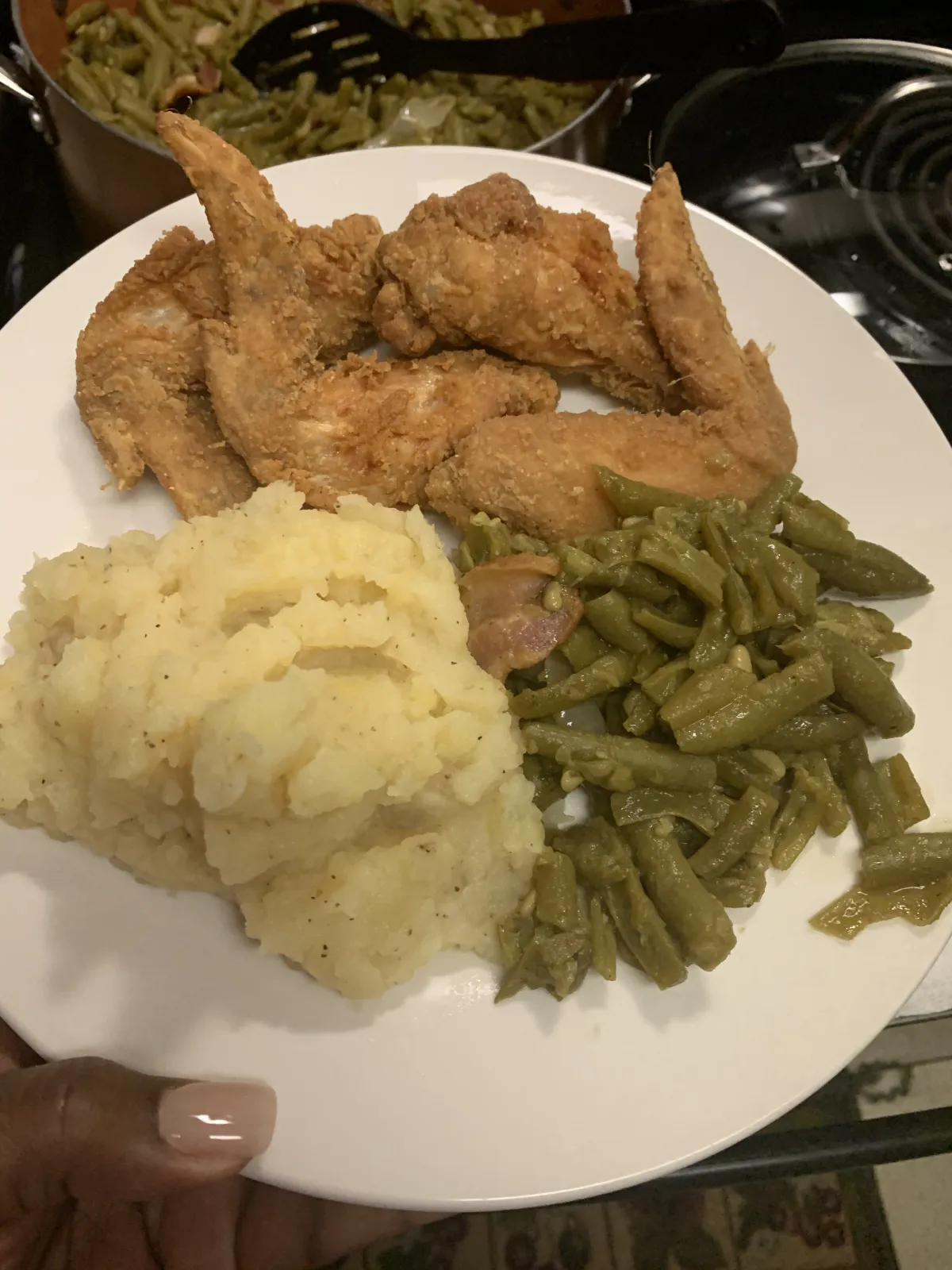 A colorful garden salad featuring edible flowers and heirloom vegetables, arranged on a rustic wooden table. Natural light streams in, enhancing the freshness and vibrant colors in a 3:2 aspect ratio.