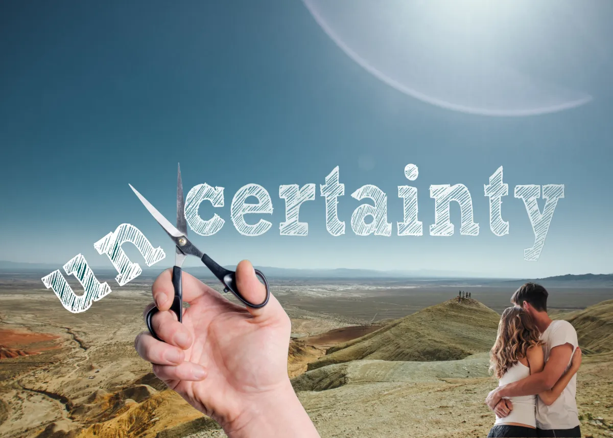 man in black suit jacket and woman in blue dress kissing during daytime