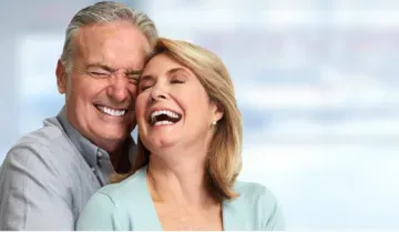 Dental implants for senior patients by Celina Texas dentist at Open Late Dental and Orthodontics – happy smiling couple