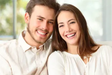 Dental implants for senior patients by Celina Texas dentist at Open Late Dental and Orthodontics – happy smiling couple