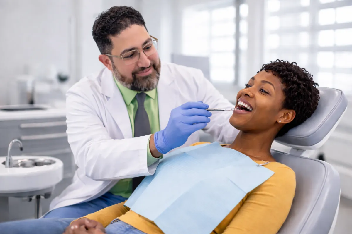 Doctor speaking calmly with a patient during a medical consultation