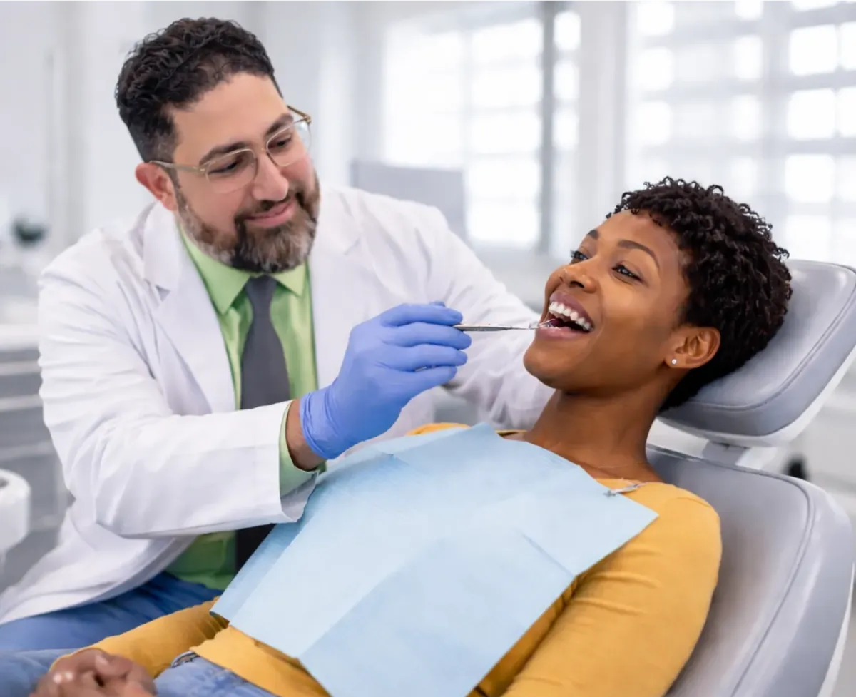 Doctor speaking calmly with a patient during a medical consultation