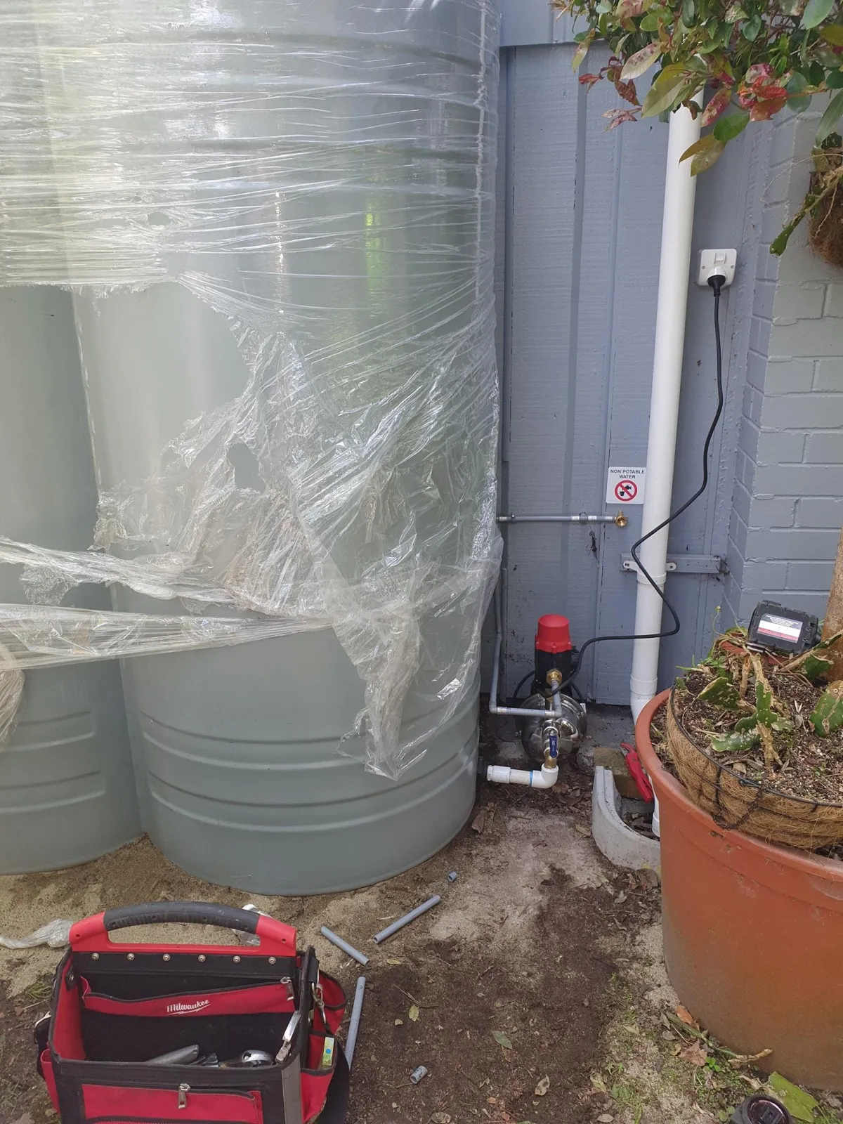 Hot water cylinder setup in Red Beach home