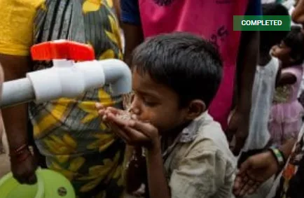 Young Villager drinking water 