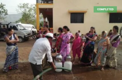 Villagers fetching water 