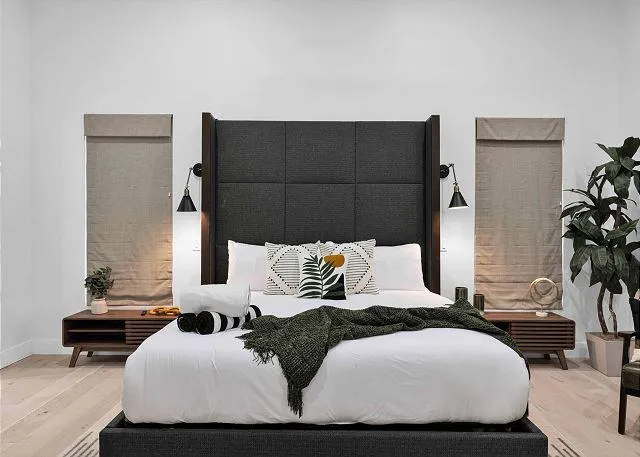 Spacious master bedroom with king-size bed and elegant furnishings