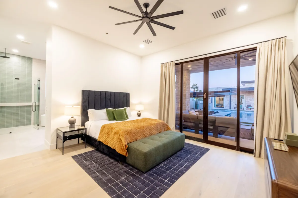 Master suite with luxurious bedding and spa-like ensuite bathroom