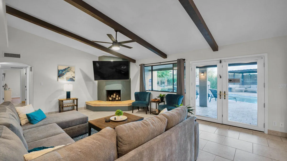 Modern living room with plush seating and natural light