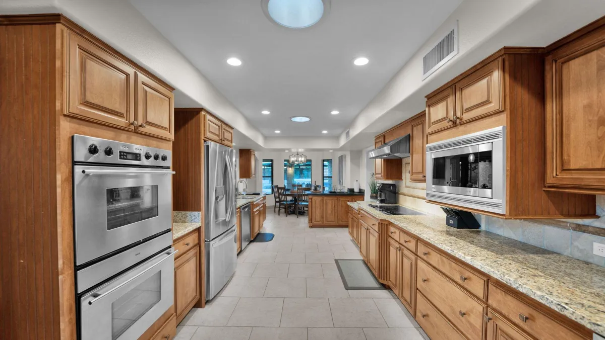 Fully equipped kitchen with high-end appliances and a large island