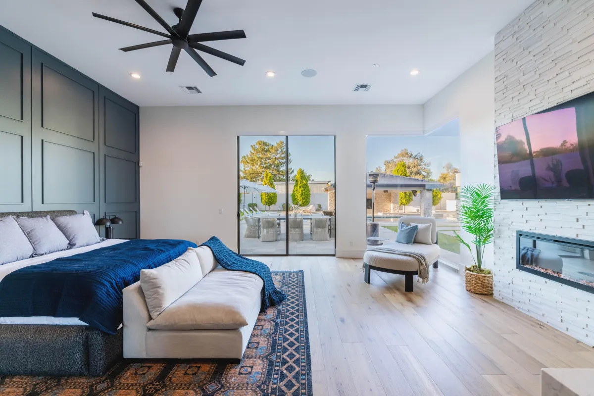 Master suite with luxurious bedding and spa-like bathroom