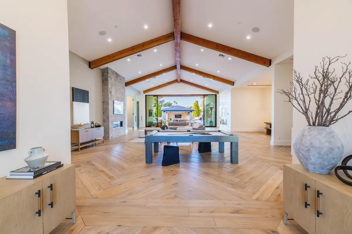 Spacious living room with vaulted ceilings and modern furnishings
