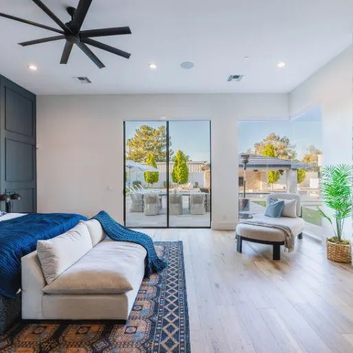 Master suite with luxurious bedding and spa-like bathroom