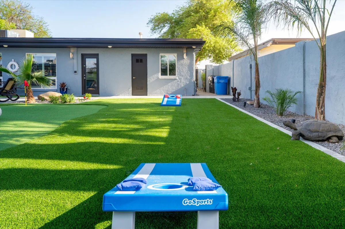 Putting green with lush landscaping