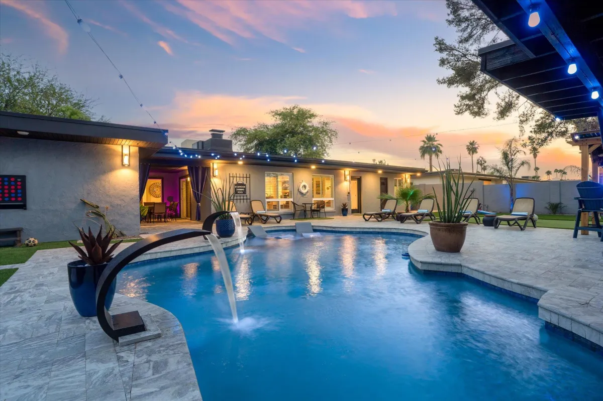 Sun-drenched poolside loungers and water features in Scottsdale luxury estate