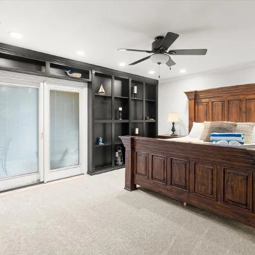 Master suite with luxurious bedding and spa-like bathroom