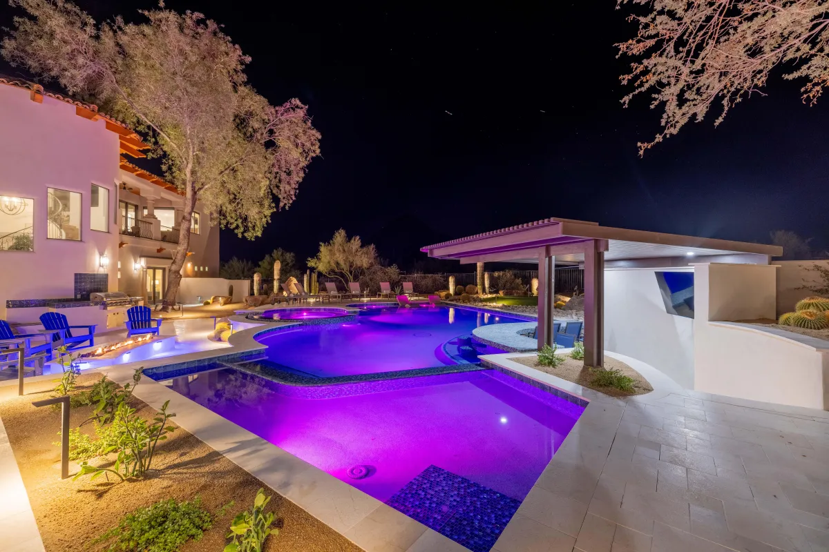 Sun-drenched poolside loungers and water features in Scottsdale luxury estate