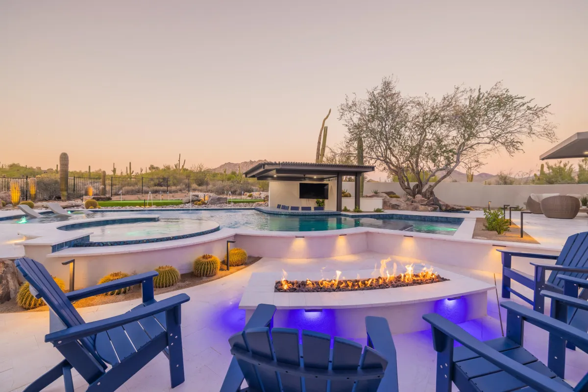 Oasis pool with covered outdoor entertainment