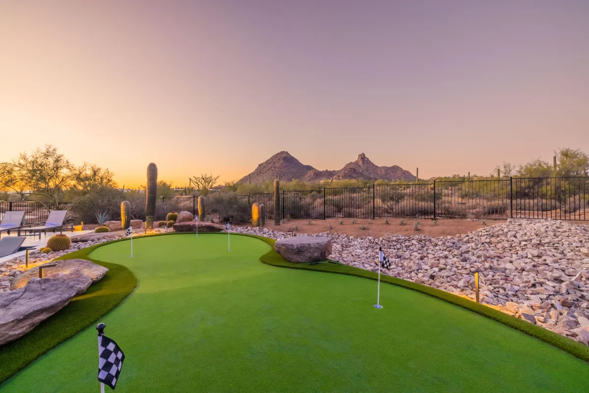State-of-the-art golf simulator room with PXG clubs and interactive games
