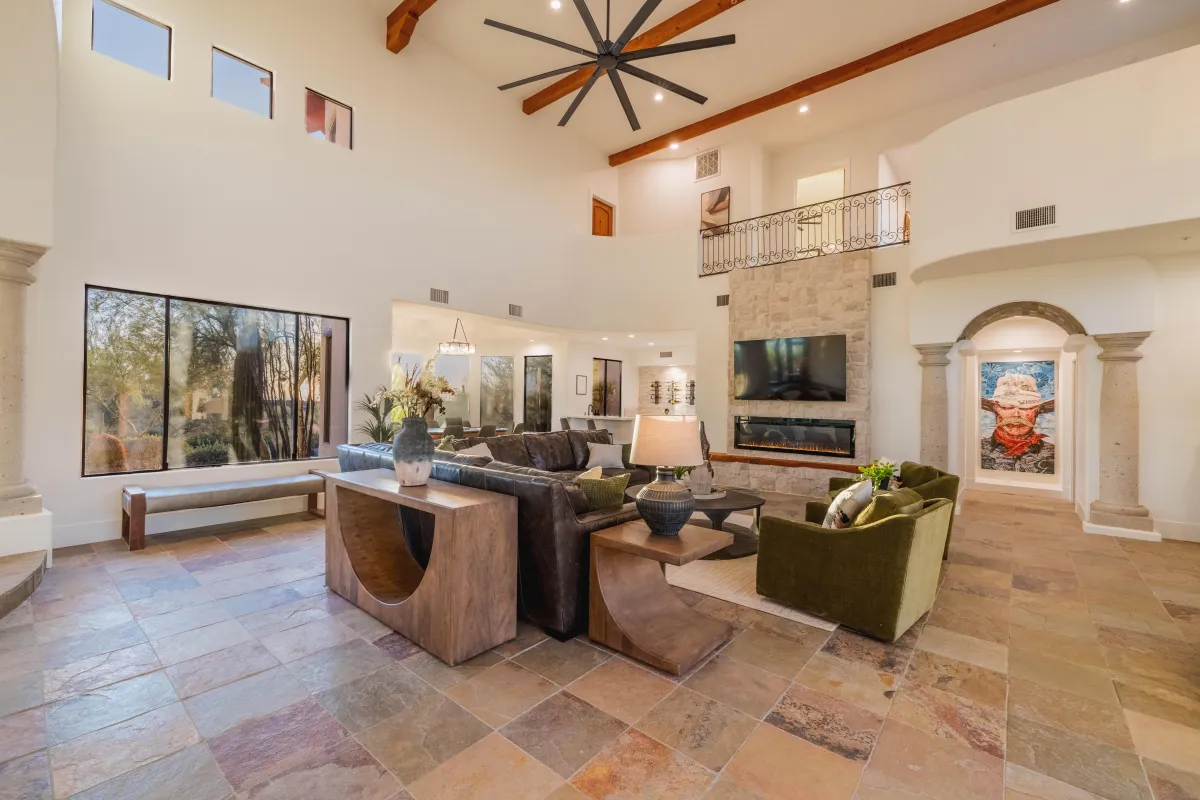 Outdoor seating with ceiling fan and tv