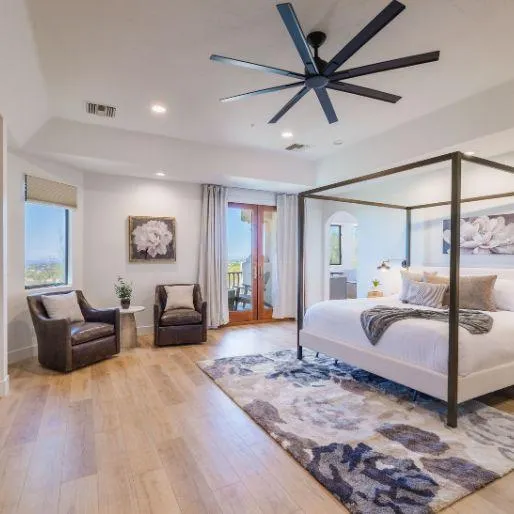 Master suite with luxurious bedding and amazing views