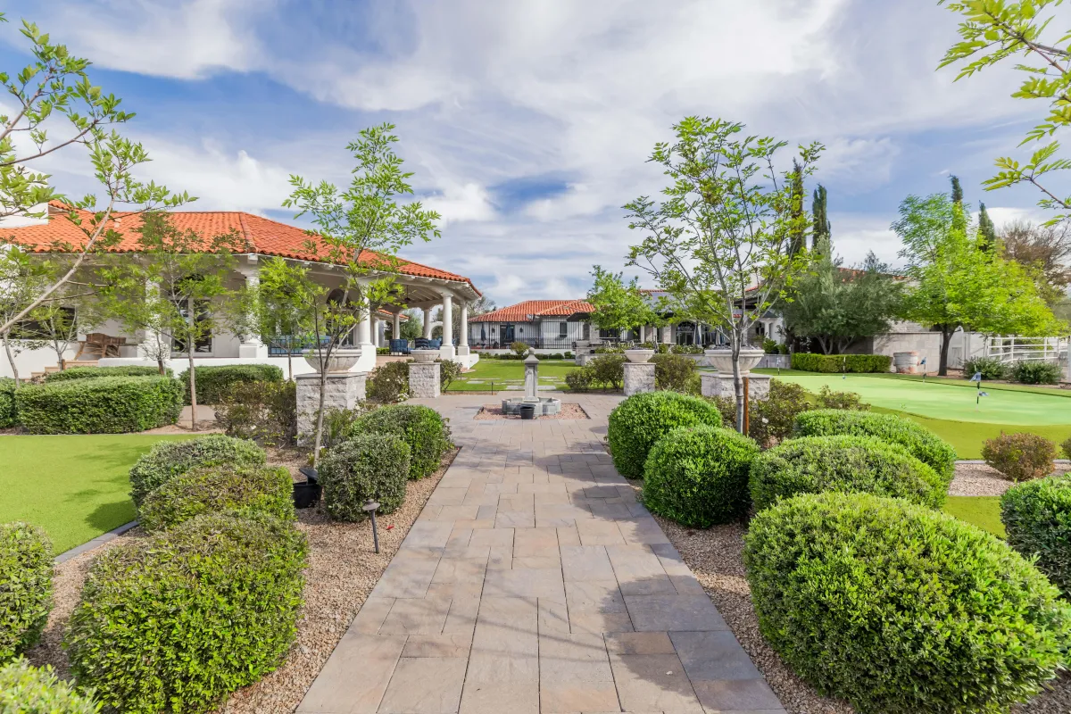 Sun-drenched poolside loungers and water features in Scottsdale luxury estate
