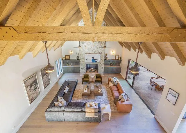 Spacious living room with plush seating and modern decor