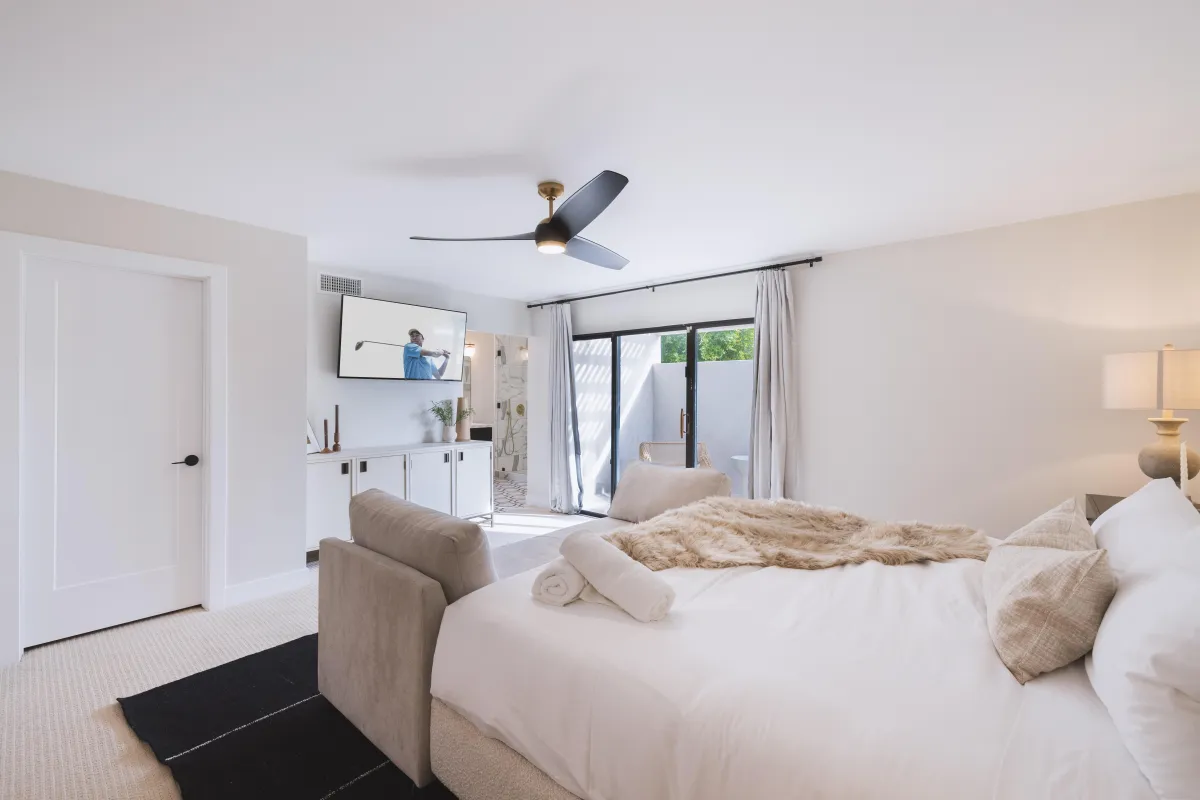 Guest bedroom with queen-size bed and elegant decor