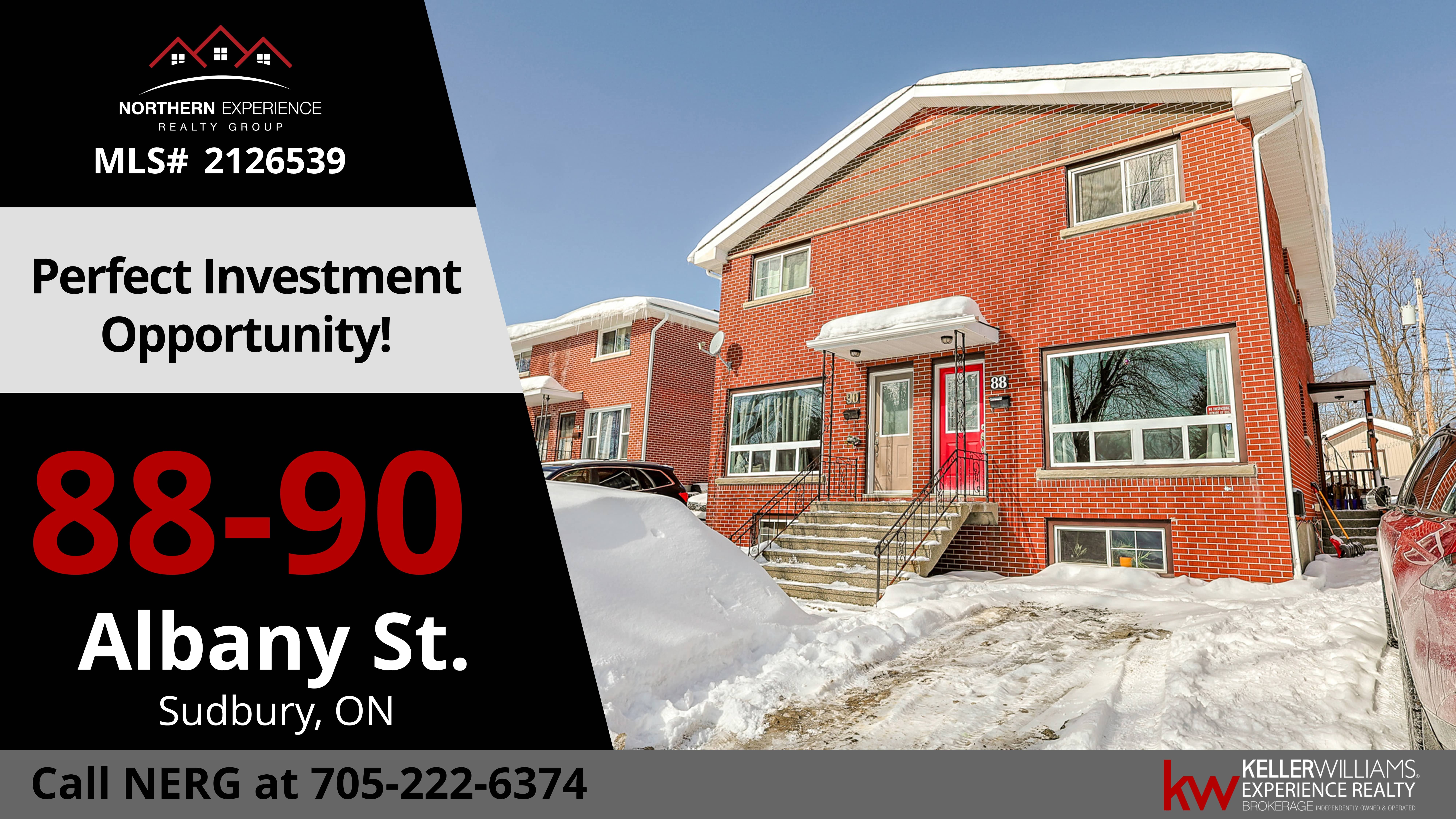 white concrete building under blue sky during daytime