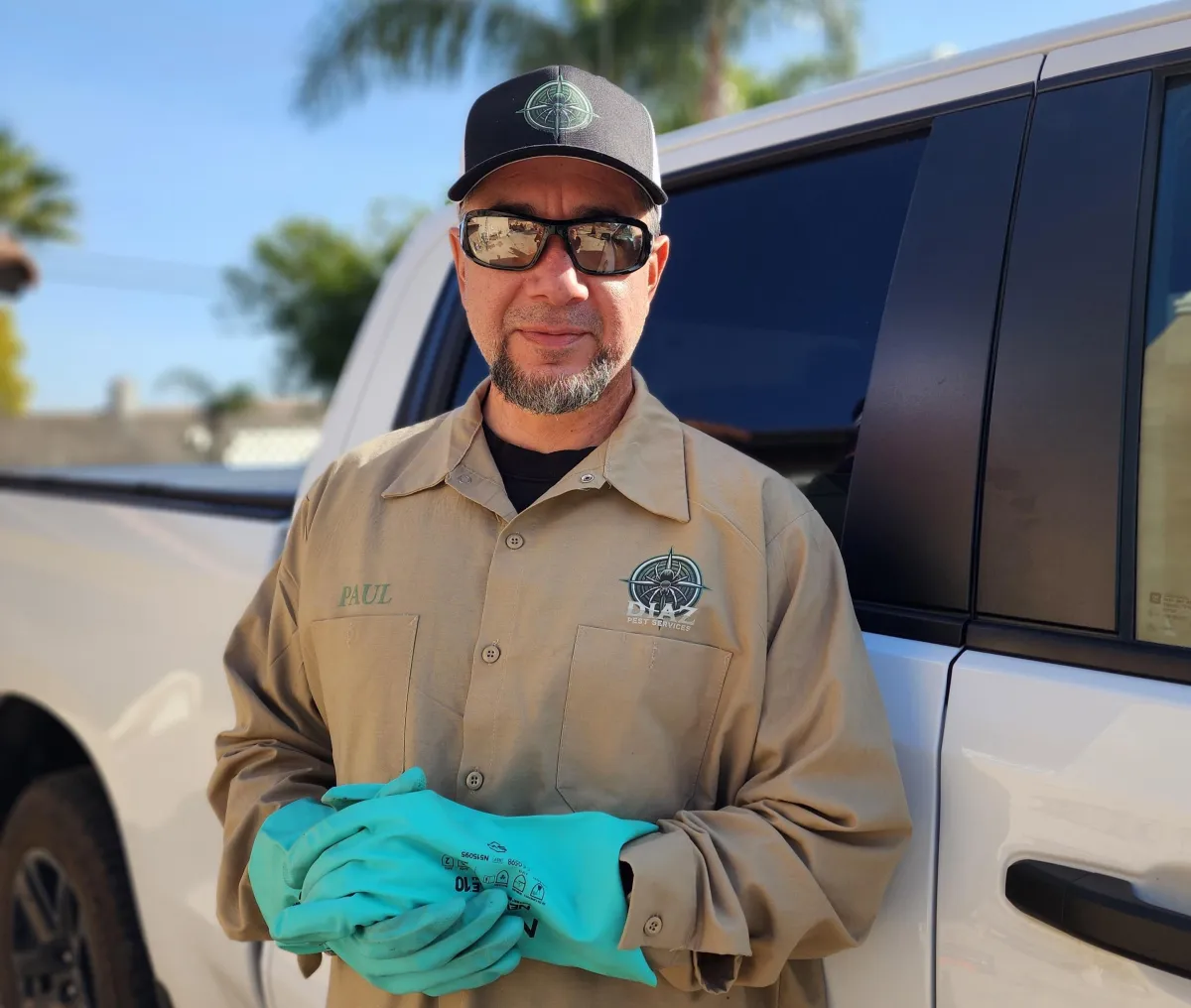 A professional pest control technician from Diaz Pest Services spraying eco-friendly treatment around a suburban home. Providing residential and commercial pest control services in he Inland Empire, includingSan Bernardino, Fontana and Rialto