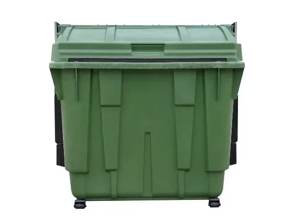 Large green plastic dumpster with closed lid isolated on a white background