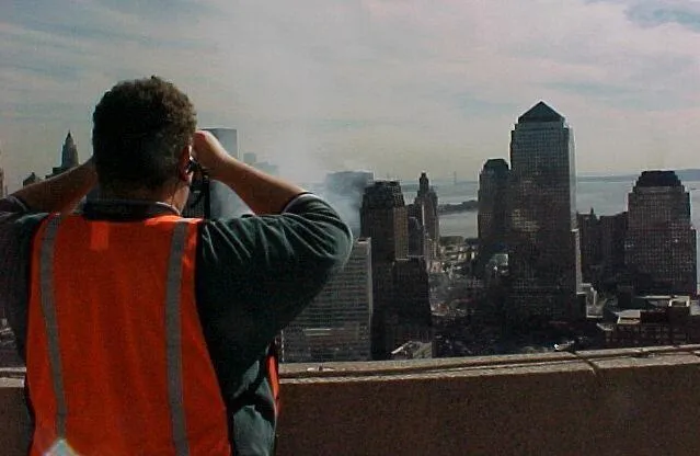 Steve Kazella verifying Line of Sight for microwave backhaul shot across ground zero Sept. 13, 2001 for emergency wireless recovery response.