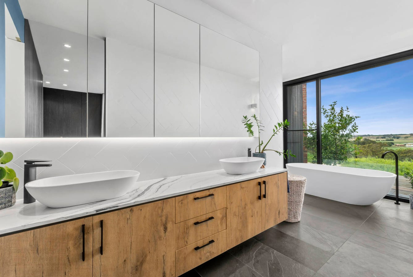 Freestanding bath by Team Dunn in Batemans Bay