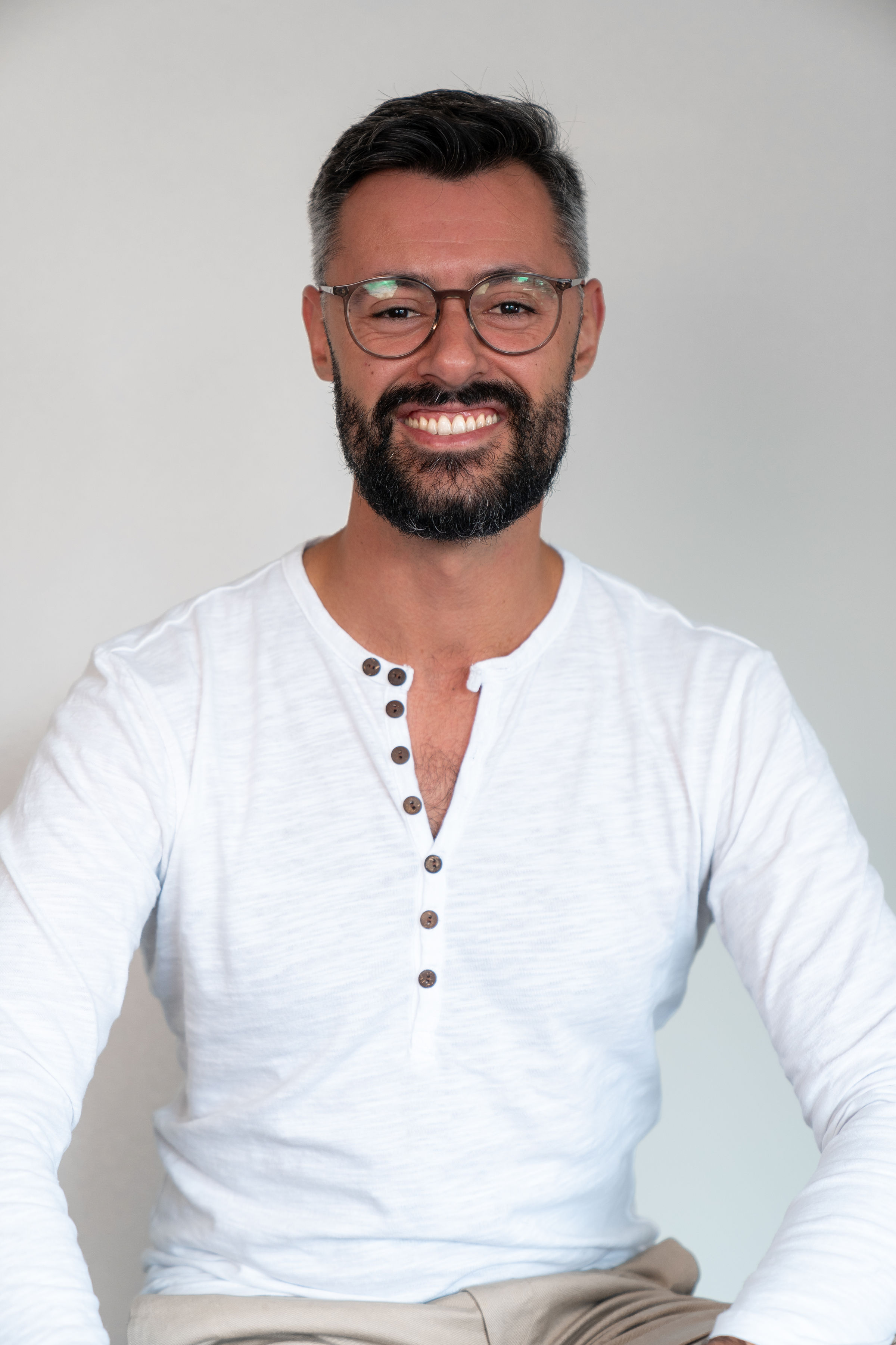 Chiropractor Eduardo Ramos smiling.