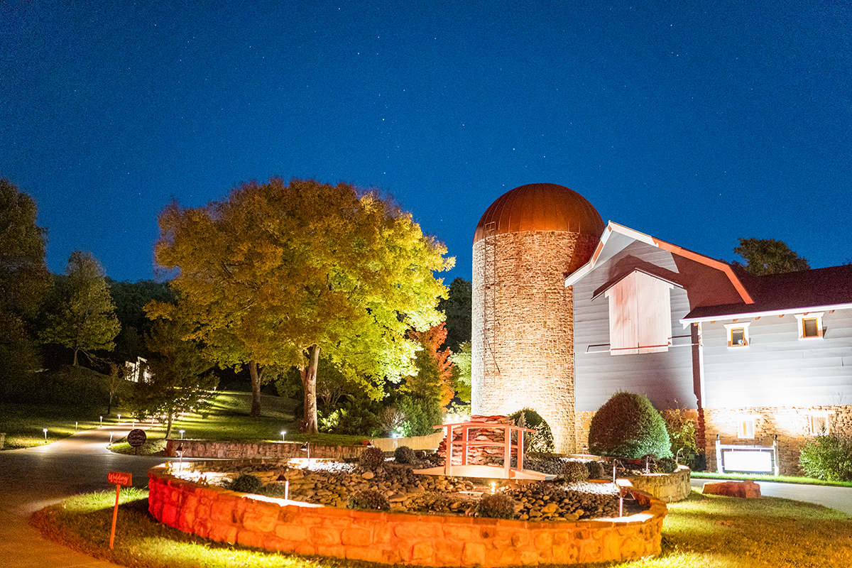 The Silo event venue set up for salsa night, with string lights and open dance floor