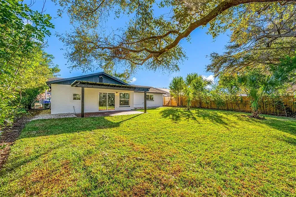 Beautifully maintained lawn and landscaping in front of a residential property