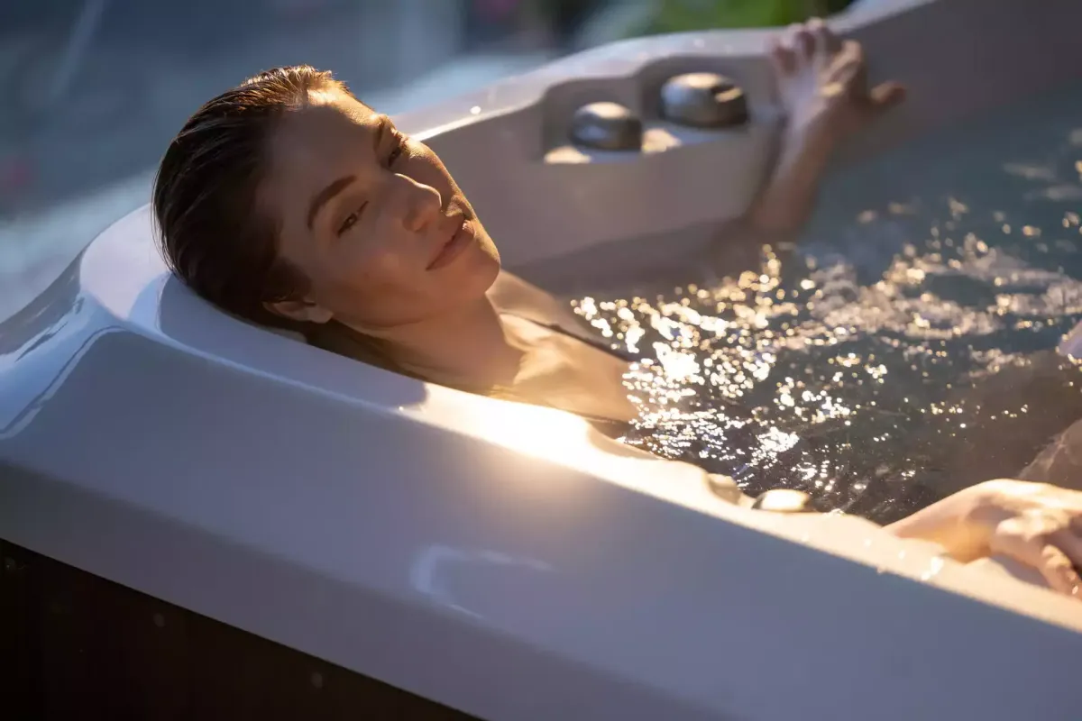 woman relaxing in the hot tub