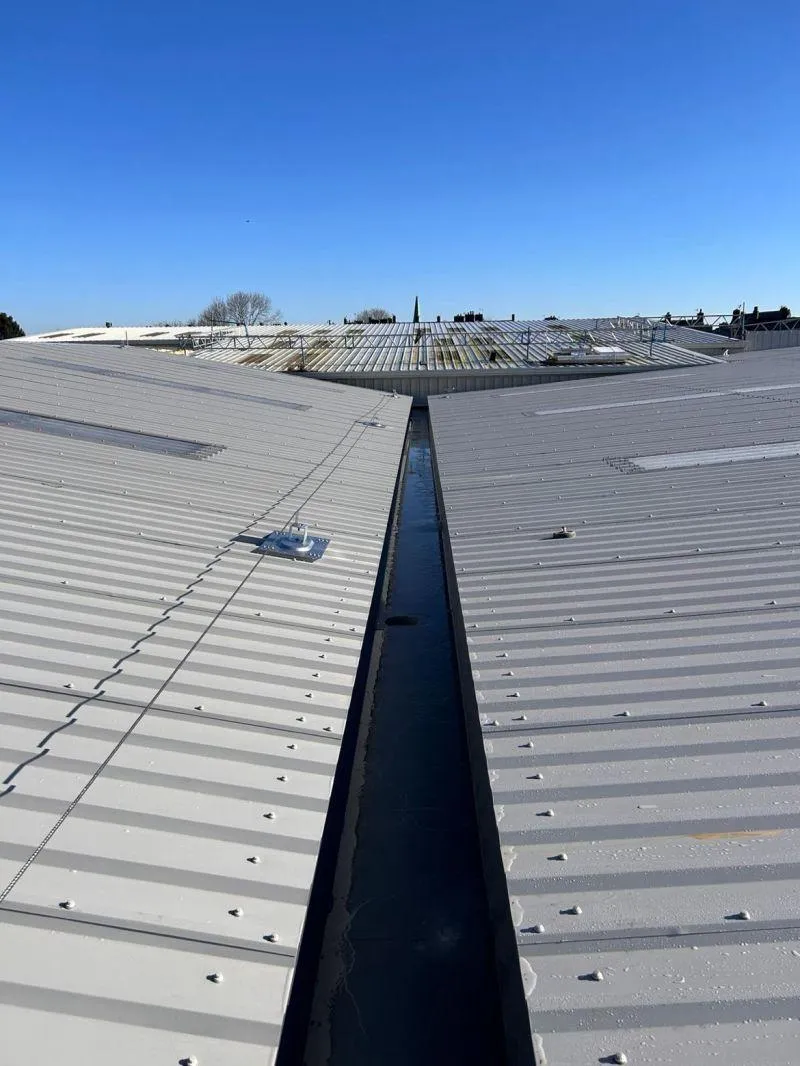 a roof  of a building with waterproofing