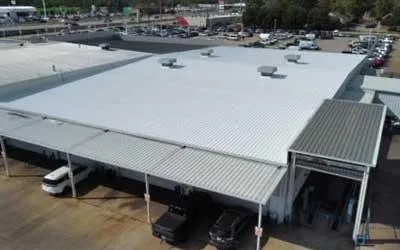 a parking lot with cars parked in the parking lot