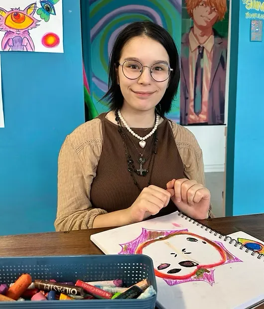 Square image capturing a teen-led mixed-media project with bold textures and spray inks, high-energy composition, studio authenticity.