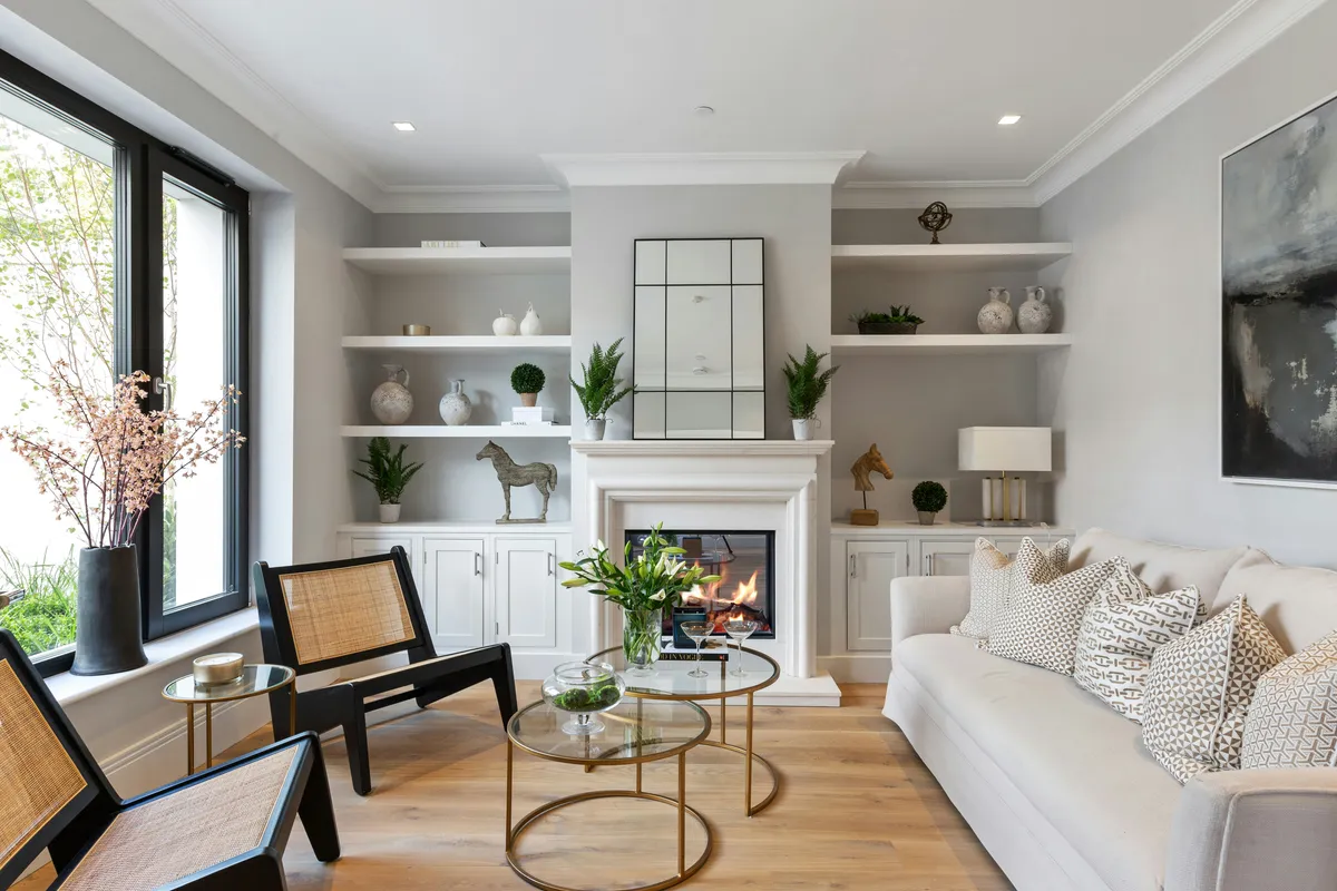 Remodeled living room with built-in shelving in San Antonio home
