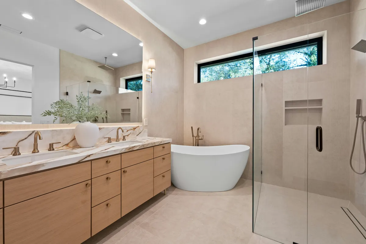 Spa-style bathroom with freestanding tub and shower