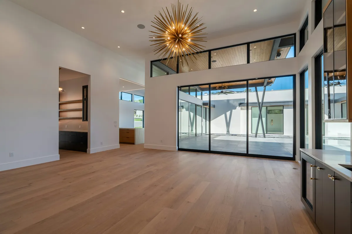 Remodeled living room with built-in shelving