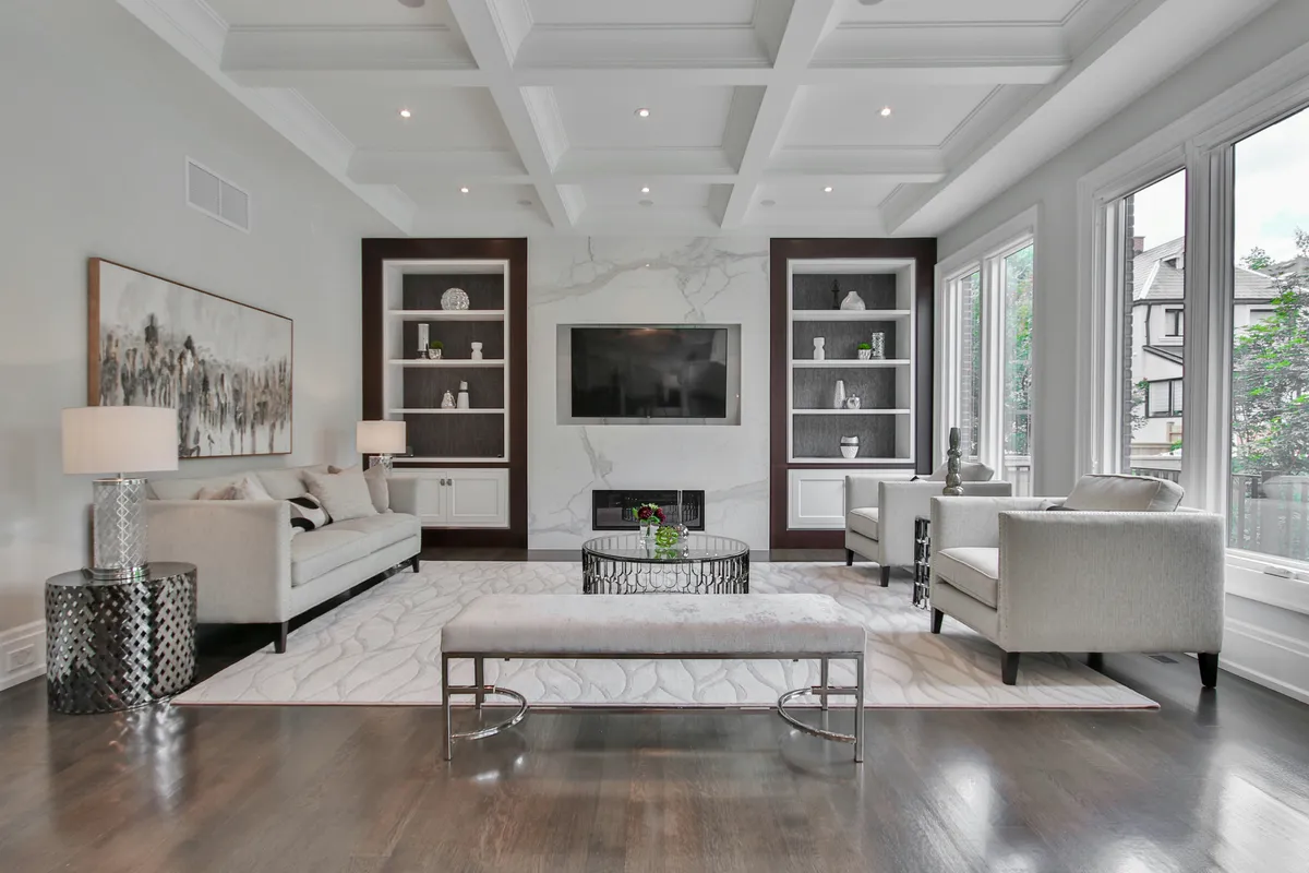 Bright renovated living room with sofa and natural light
