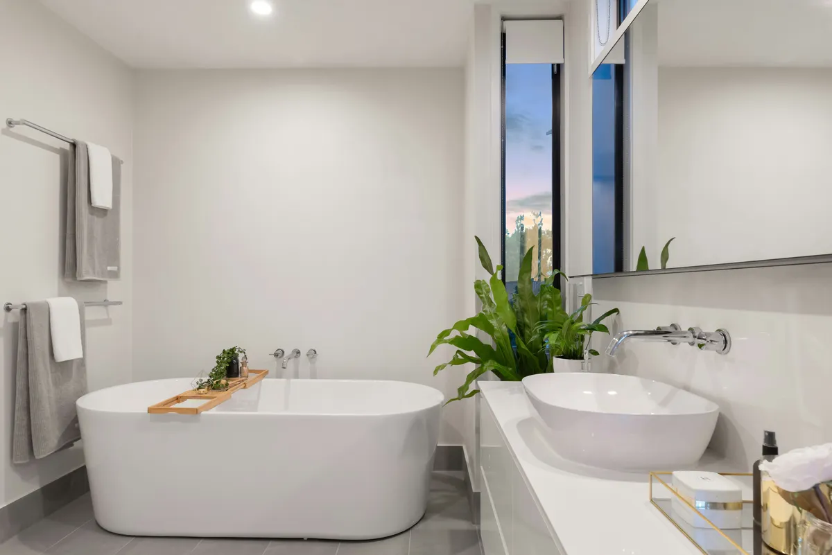 White shaker kitchen with quartz countertops