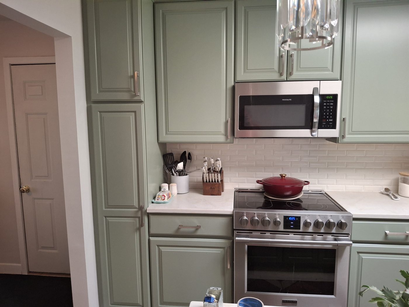 Remodeled kitchen with new cabinets and countertops in a Denver-area home