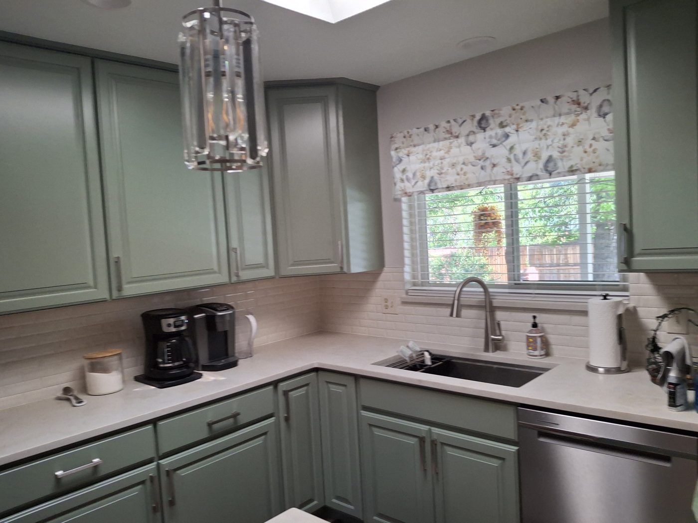 New kitchen cabinets, countertop and sink after a Denver-area remodel