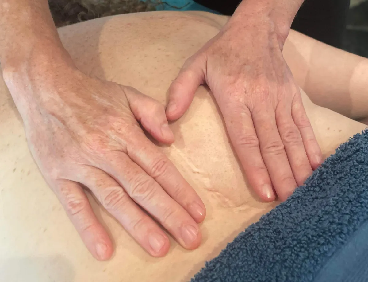 Treating a scar with gentle massage techniques