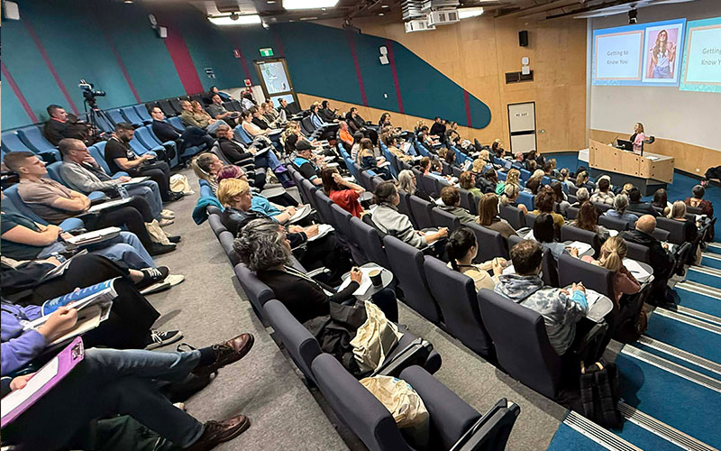 Elicia speaking at Melbourne Institute of Massage Therapy Conference