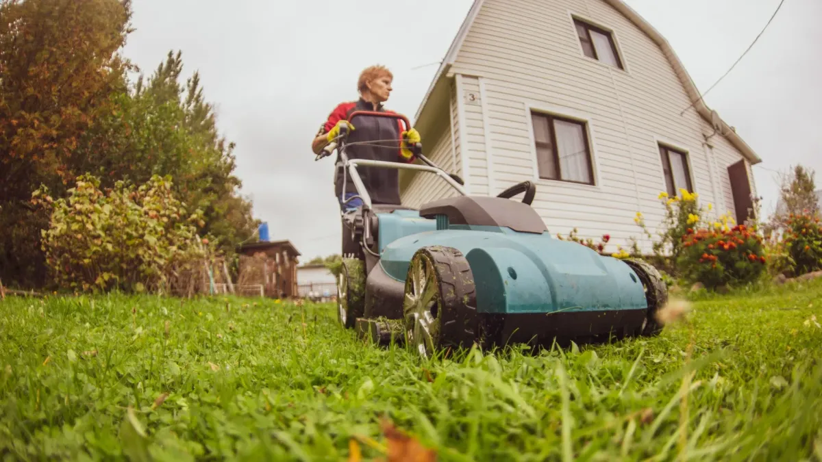 mowing and lawn care Sebastopol, CA — crew mowing and edging front lawn — A & J Yard Service