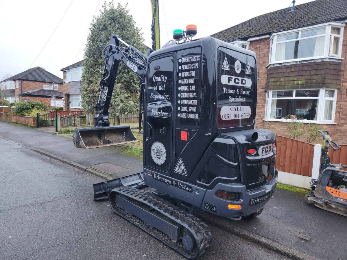 black metal rail beside pavement